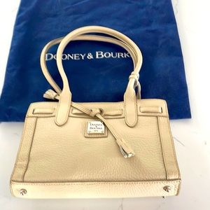 Brand new satchel purse with cute interior lining.